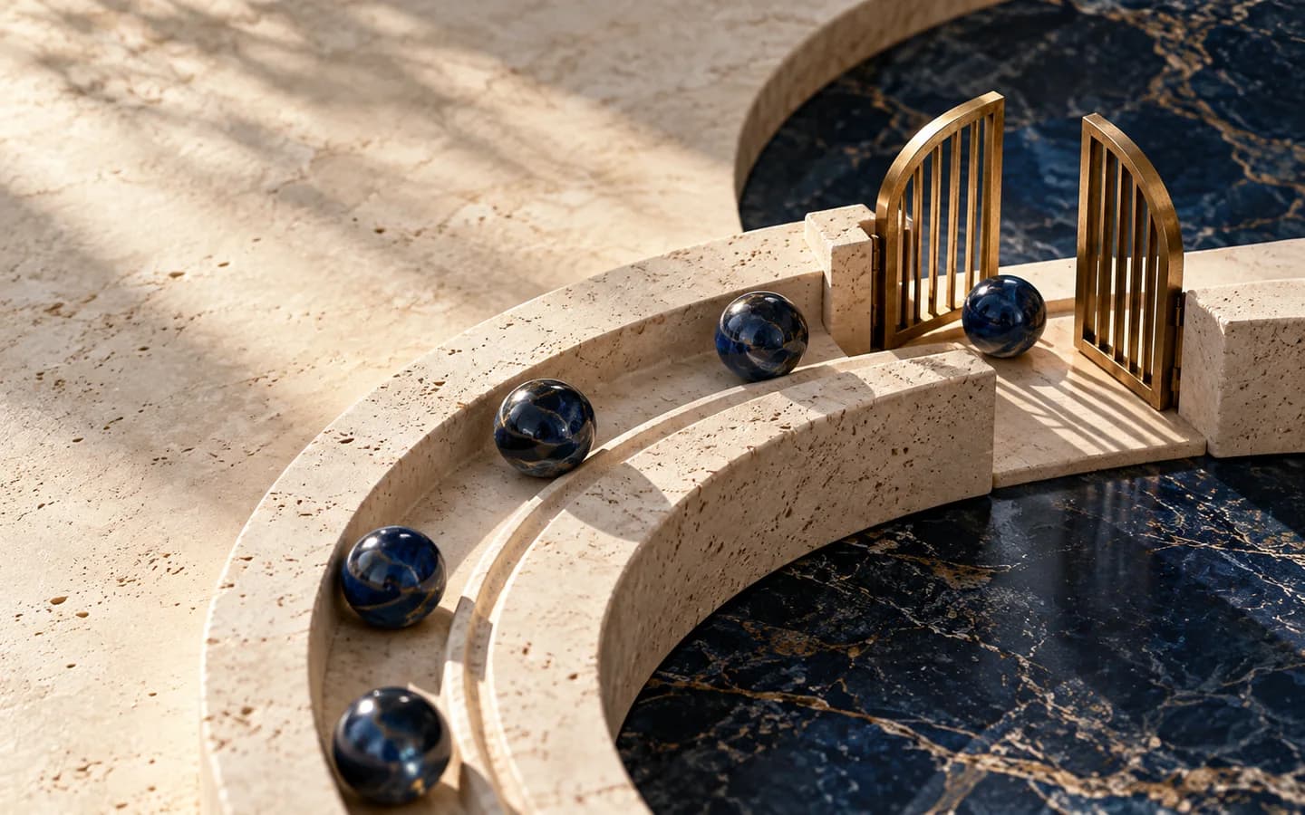 Blue glass marbles circle a limestone track toward an open brass gate.
